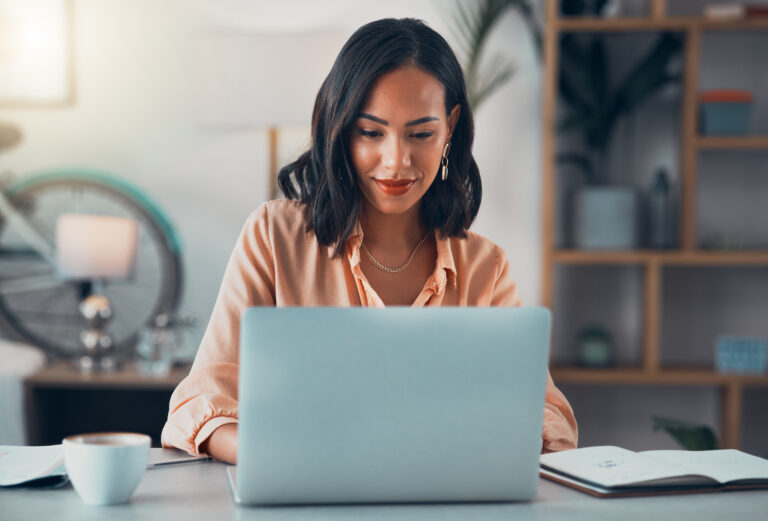 Young woman attending a virtual therapy session at home