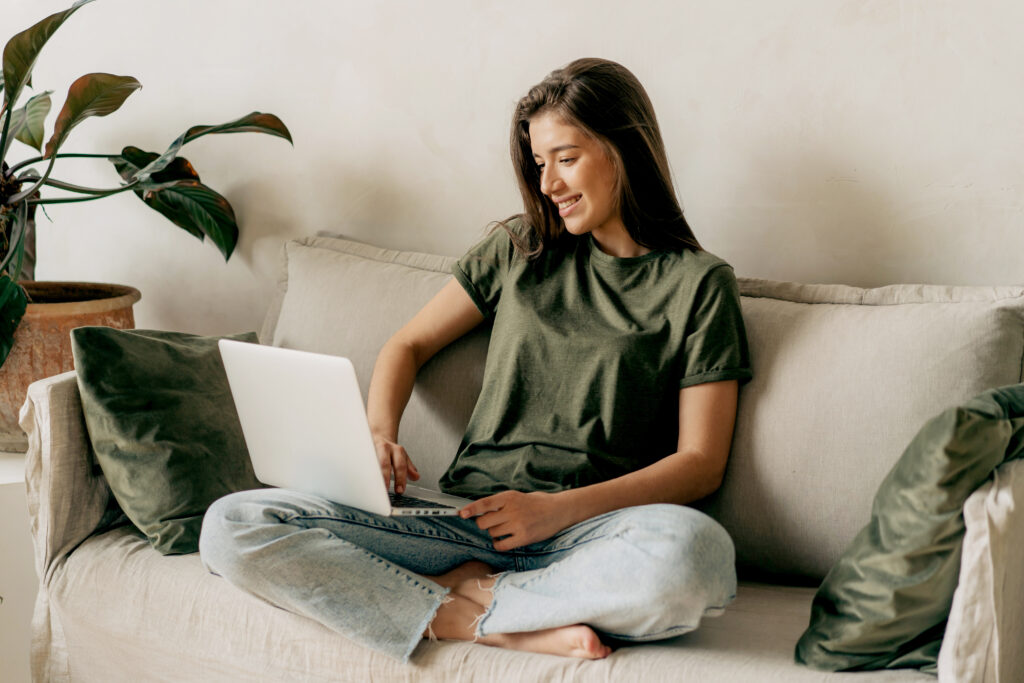 Young woman attending an online therapy session