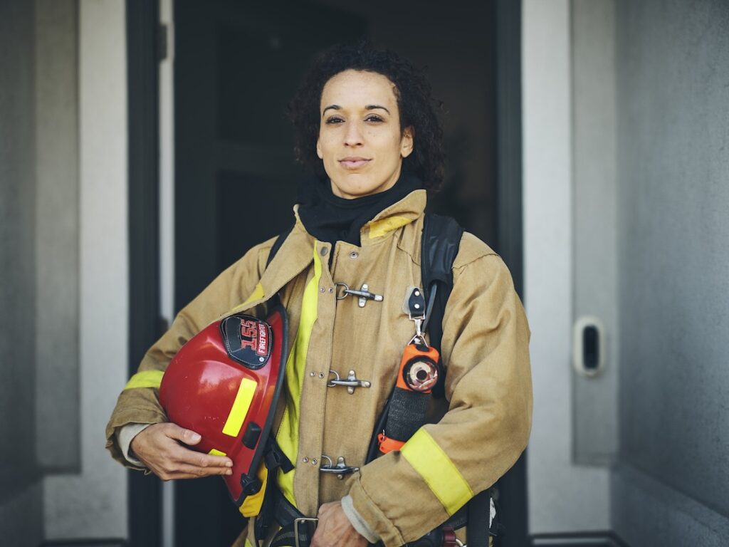 Female first responder looking at the camera smiling gently